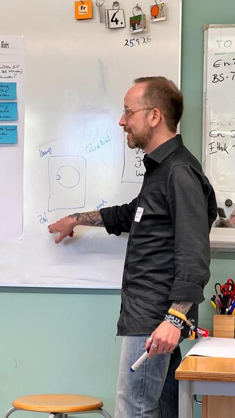 Michael Schiller, at the whiteboard